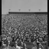 Spectators at post-season track meet between the Big Ten and Pacific Coast conferences.  June 27, 1937.
