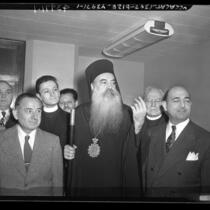 Patriarch Athenagoras, Archbishop of Greek Orthodox Church, with group of men in Los Angeles, Calif., 1948