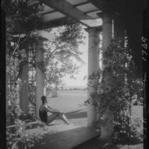 Woman under pergola, Virginia Hotel, Long Beach, 1929