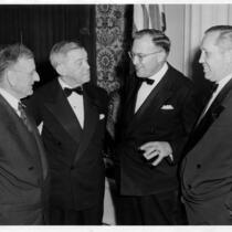 Small group including UC Regent Edward A. Dickson and Chancellor Raymond Allen, c.1950s