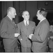 William J. Cook, Edward Levine, and unidentified man at the liquor license bribe trial, Oct. 1939 - May 1940