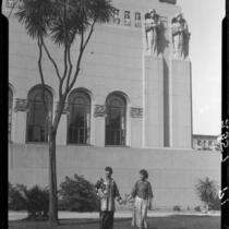Rosemary Chew and Olive Young standing in front of the Elk's Lodge No. 99, Los Angeles, 1928