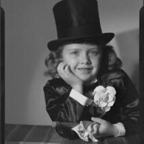Helena Burnett in tuxedo costume and top hat, 1947-1950
