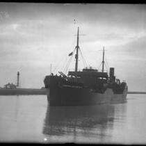 Full length view of ship, Freeport Sulphur No.6, carrying Phil Alguin entering Brazos River