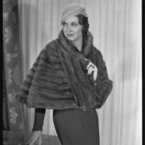 Actress Gail Patrick modeling a mink fur stole from Beckman's, 1933