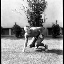 Football player posing, c.1928