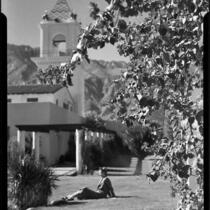 Woman seated on lawn, El Mirador Hotel, Palm Springs, 1935
