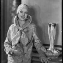 Actress (?) modeling a fur jacket, circa 1931-1933