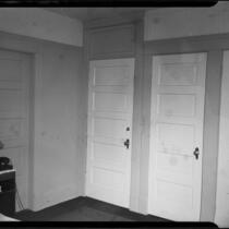 Hotel room with three doors in Windemere Hotel, Santa Monica, 1955