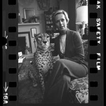 Tippi Hedren with her pet cheetah, Pharaoh in the living room of her home in Los Angeles, Calif., 1974