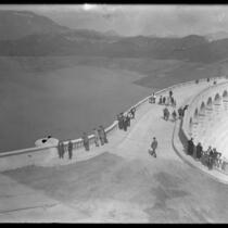 People on Mulholland Dam the day it was opened in Los Angeles, Calif., 1925