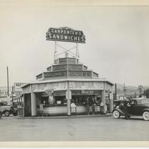 Automobiles and customers in front of Carpenter's Sandwiches stand, Los Angeles