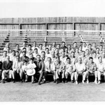 Alumi Association Annual Picnic group photo with coaches, 1952
