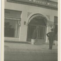 Man in front of Walter M. Murphy Motor Co., 932 S. Hope St., Los Angeles, 1922