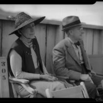 Two spectators at the Palm Springs Field Club during the Desert Circus Rodeo, Palm Springs, 1938