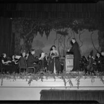 Concert with woman soloist and orchestra onstage, related to production of La Traviata, Hollywood or Pomona, 1949