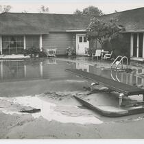Flooded pool behind a residence, Los Angeles, 1952