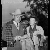 Actor Buck Jones and wife Odelle at Santa Anita Racetrack, Calif., 1940