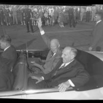 Dwight Eisenhower and Goodwin Jess Knight riding in motorcade in Los Angeles, Calif., 1954