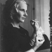 Margaret Schulze with cigarettes and card case, [1930s]