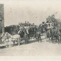 High school class in horse carriages
