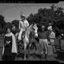 Actor Leo Carrillo and Irvin S. Cobb at Palm Sunday service for El Camino Real Horse Trails Association on Providencia Rancho, Calif., 1941