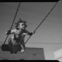 Girl on swing, Los Angeles, circa 1935