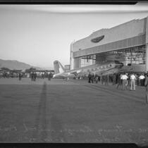 Plane carrying the bodies of Will Rogers and Wiley Post arrives at Union Air Terminal, Burbank, 1935
