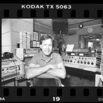 Disc jockey Rick Dees in KIIS FM studio, Calif., 1986