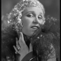 Peggy Hamilton modeling a metallic wig, circa 1925