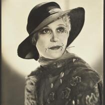Peggy Hamilton modeling a Hortense hat made from baku, 1932