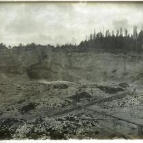 Hydraulic mining operation in a open pit in a mountain area (unidentified), California, circa 1880-1900