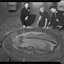 Santa Monica City Hall dedication, three women and city seal, Santa Monica, 1939