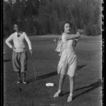 Sally Phipps and Lew Owen playing golf, Lake Arrowhead, 1929