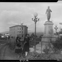 View of street in Ensenada with statue of Miguel Hidalgo, Ensenada, 1931